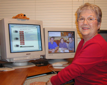 Joye (Hamm) Malmstrom at computer